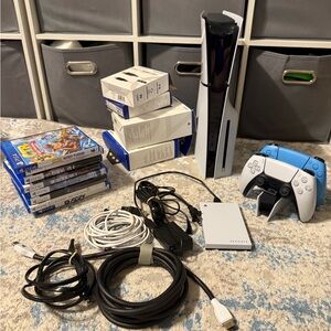 Sony PlayStation 5 Console with Blue and White Controller